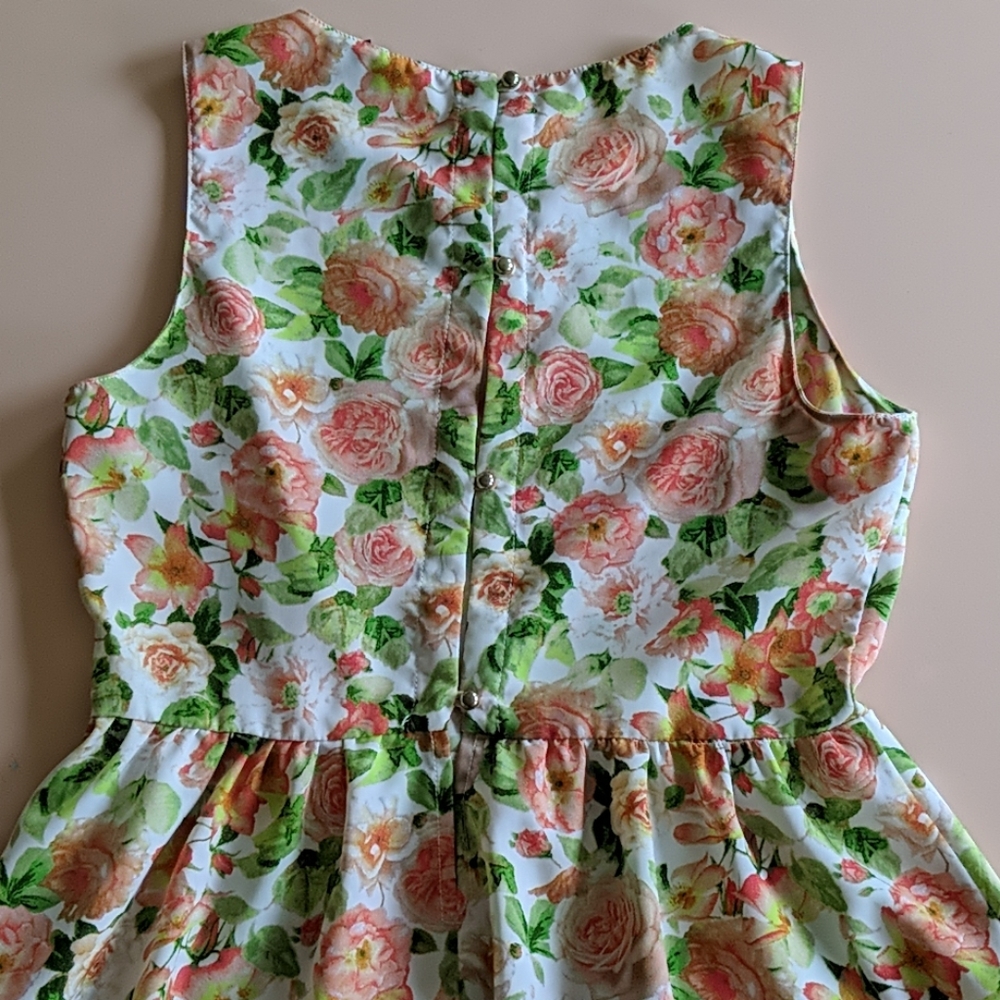 Floral Peplum Sleeveless Blouse
